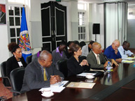 Commissioners Dinah Shelton and Tracy Robinson in a meeting with Winston Lackin, Minister of Foreign Affairs of Suriname.